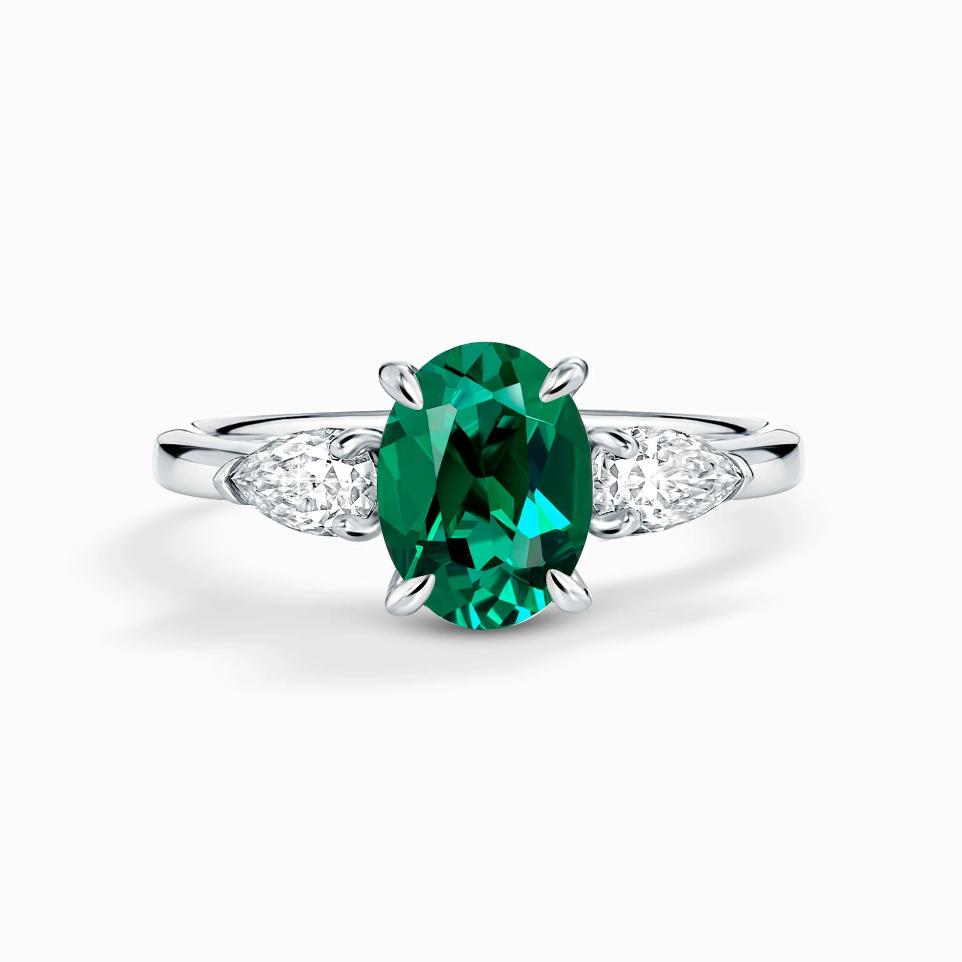Emerald Oval Cut Three Stone Engagement Ring in Sterling Silver - SJR London Timepiece