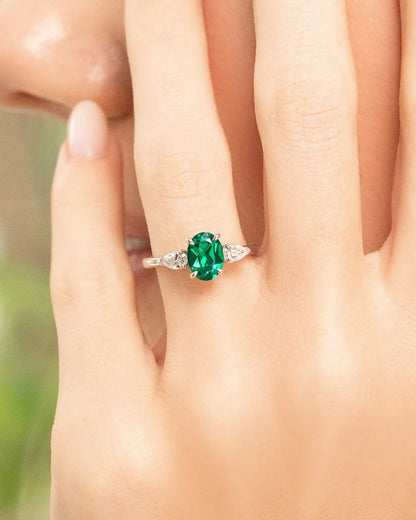 Emerald Oval Cut Three Stone Engagement Ring in Sterling Silver - SJR London Timepiece
