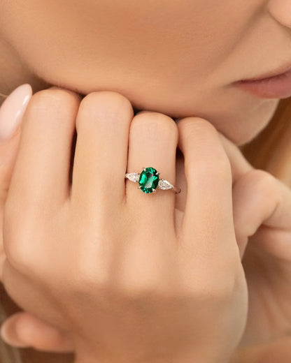 Emerald Oval Cut Three Stone Engagement Ring in Sterling Silver - SJR London Timepiece