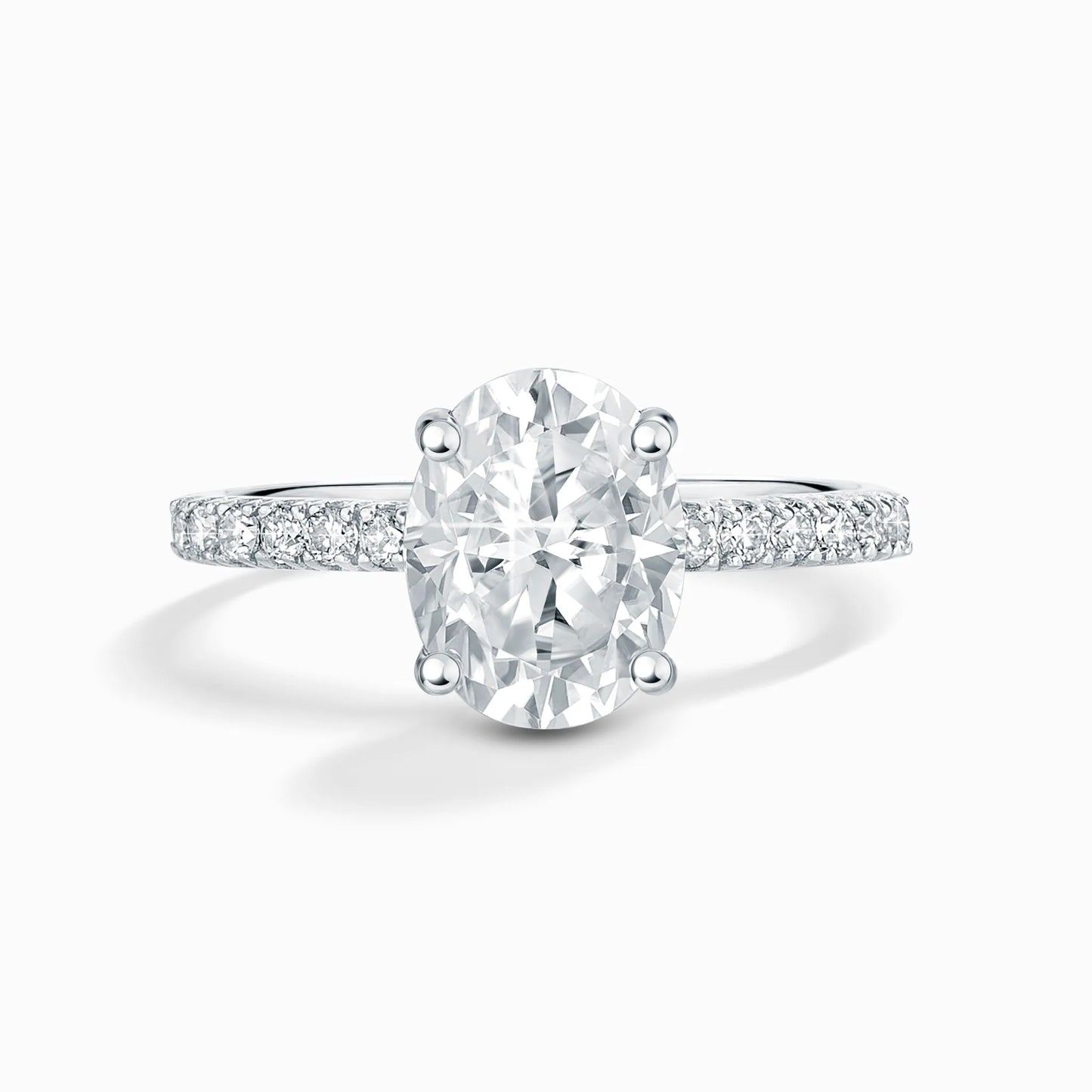 2 ct Oval Solitaire Moissanite Engagement Ring with Pavé Band in Sterling Silver - SJR London Timepiece