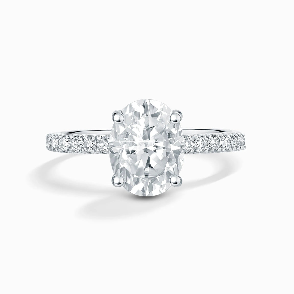 2 ct Oval Solitaire Moissanite Engagement Ring with Pavé Band in Sterling Silver - SJR London Timepiece