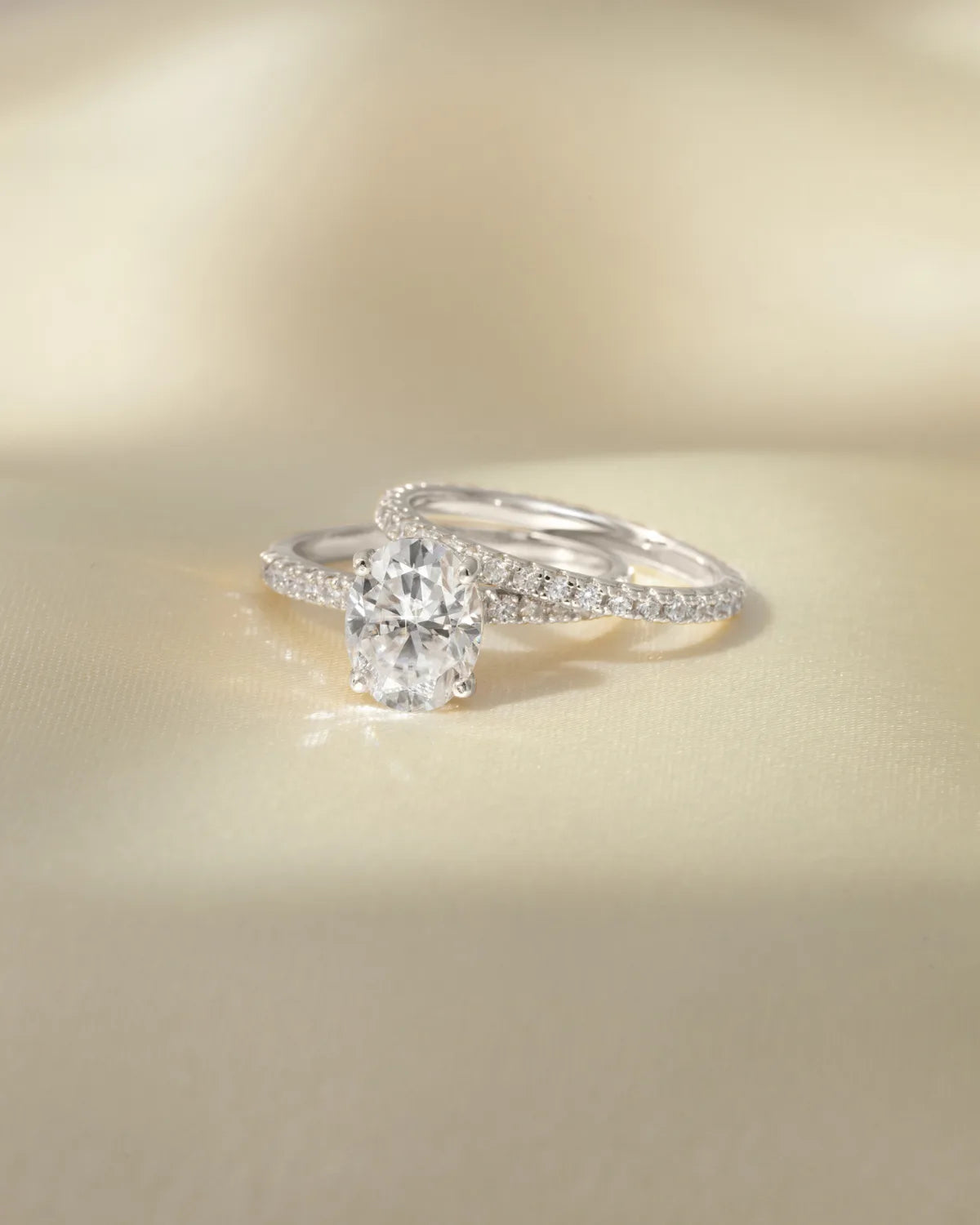 2 ct Oval Solitaire Moissanite Engagement Ring with Pavé Band in Sterling Silver - SJR London Timepiece
