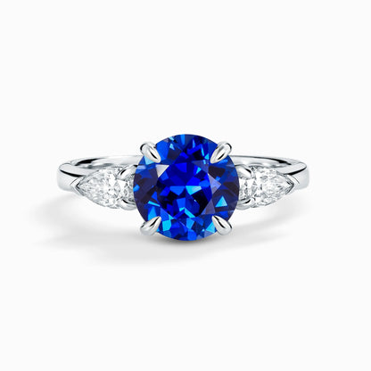Blue Sapphire Round Cut Three Stone Engagement Ring in Sterling Silver - SJR London Timepiece