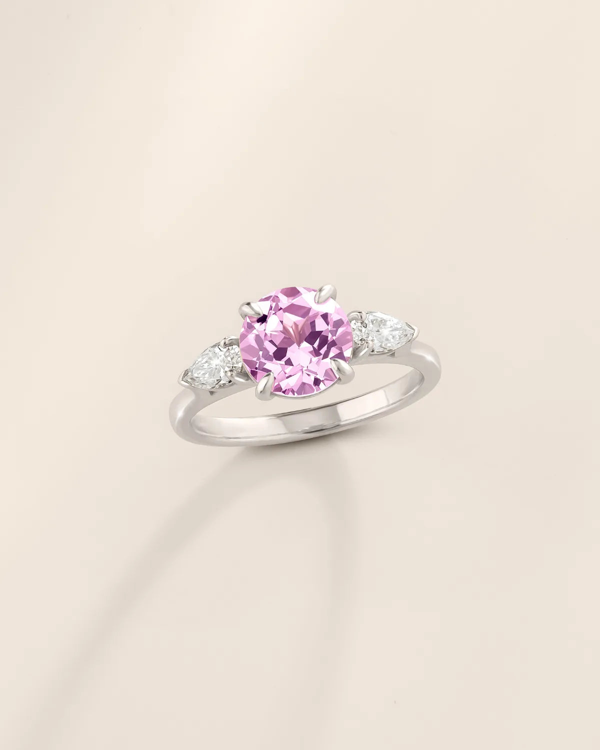Pink Sapphire Round Cut Three Stone Engagement Ring in Sterling Silver - SJR London Timepiece