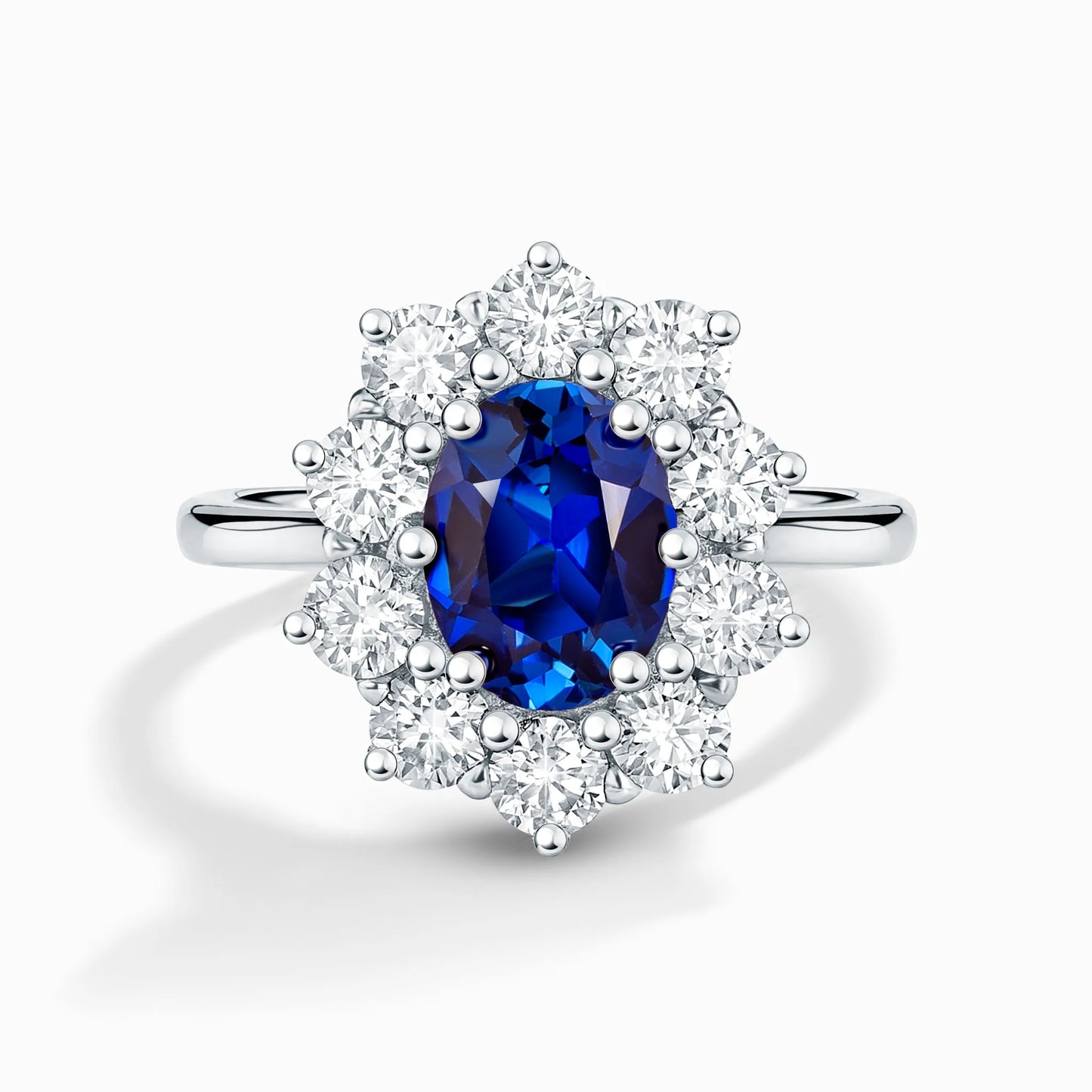 Blue Sapphire Halo Engagement Ring in Sterling Silver - SJR London Timepiece