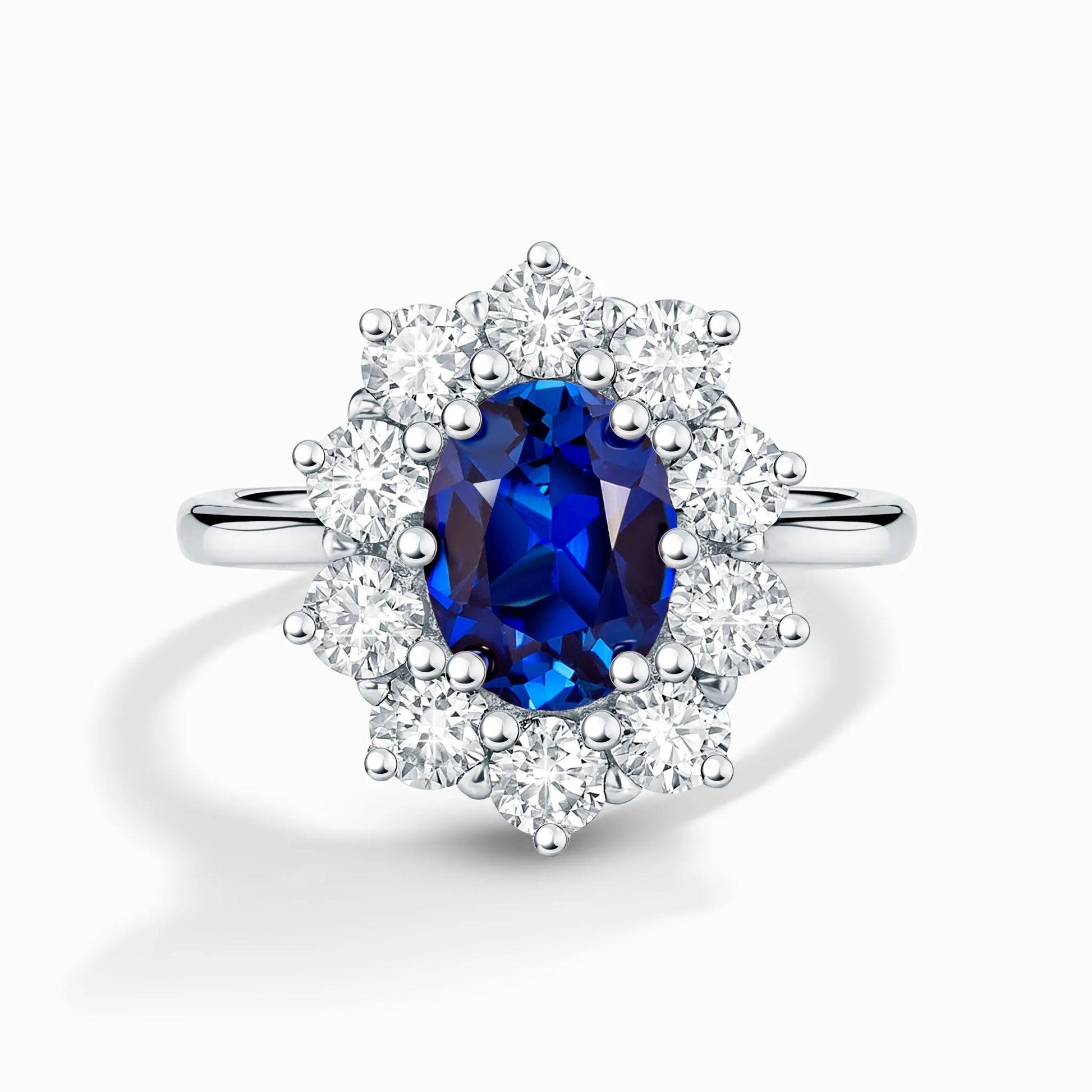 Blue Sapphire Halo Engagement Ring in Sterling Silver - SJR London Timepiece