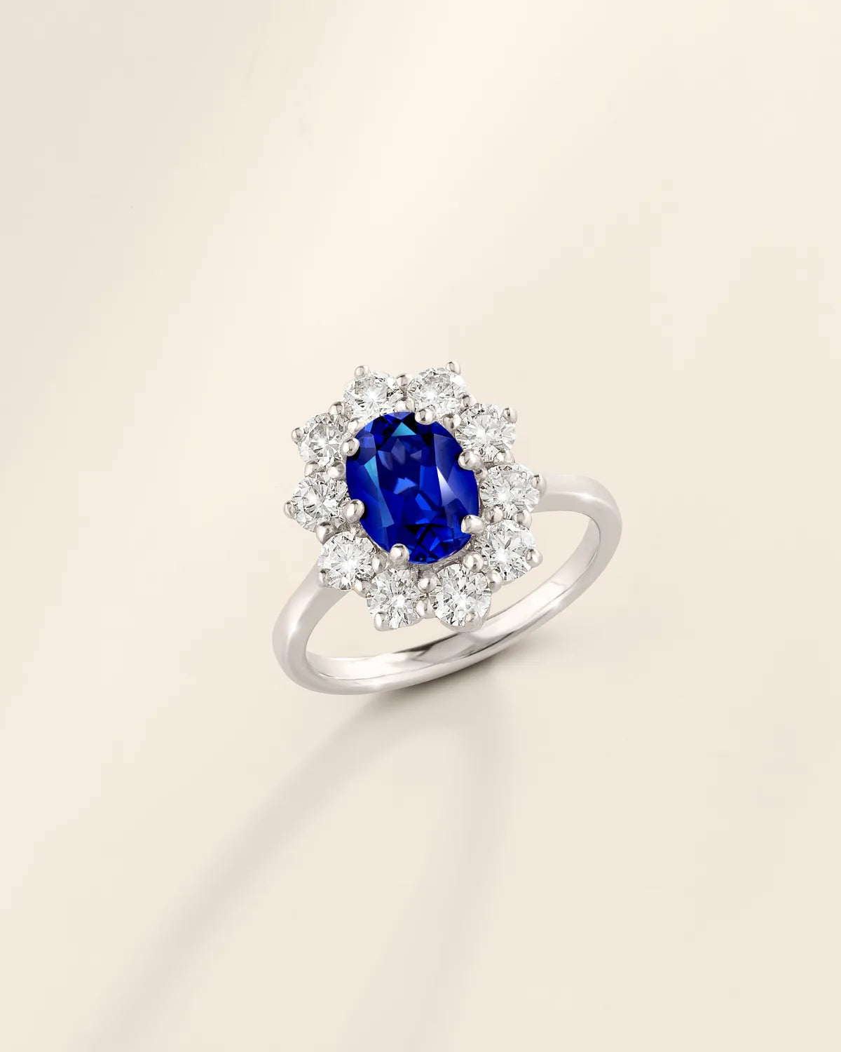 Blue Sapphire Halo Engagement Ring in Sterling Silver - SJR London Timepiece