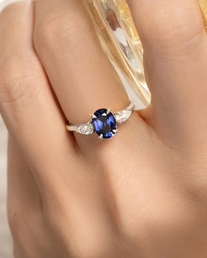 Blue Sapphire Oval Cut Three Stone Engagement Ring in Sterling Silver - SJR London Timepiece