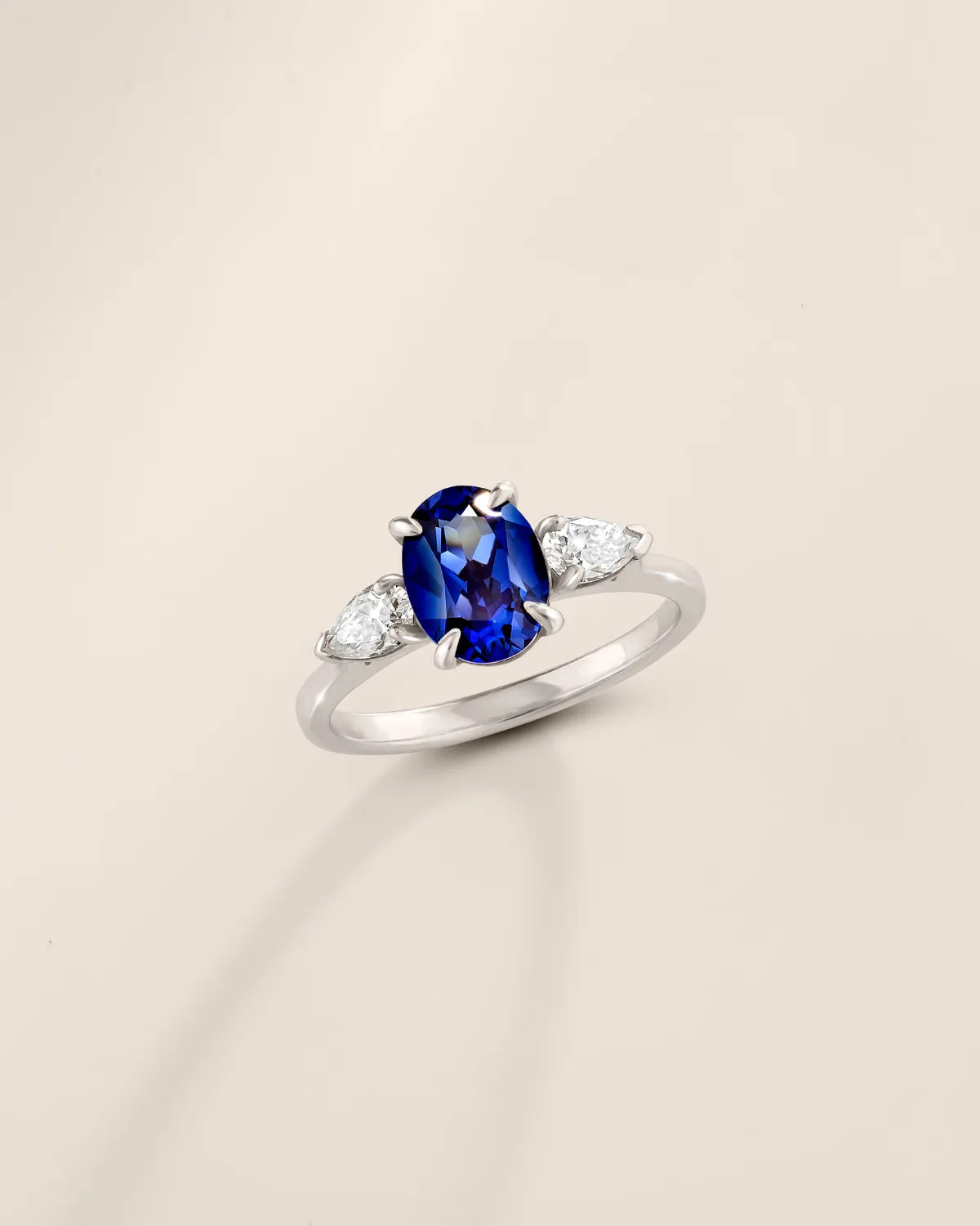 Blue Sapphire Oval Cut Three Stone Engagement Ring in Sterling Silver - SJR London Timepiece