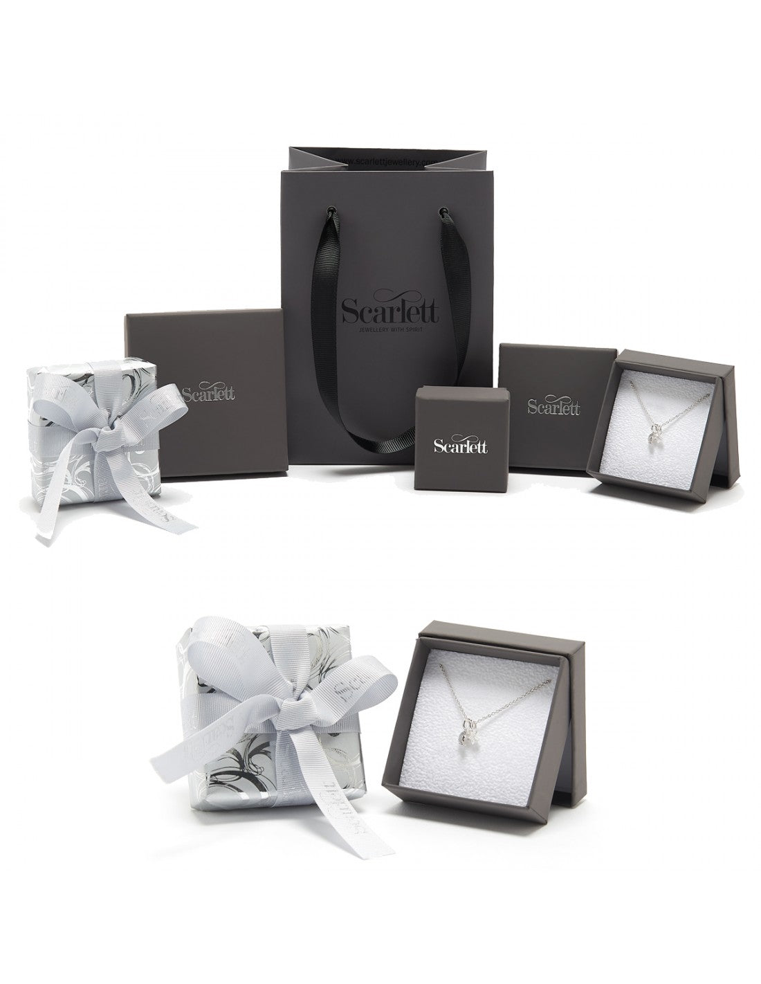 A silver mini lifetime charm bracelet with heart and star charms, displayed on a white background by Scarlett Jewellery.
