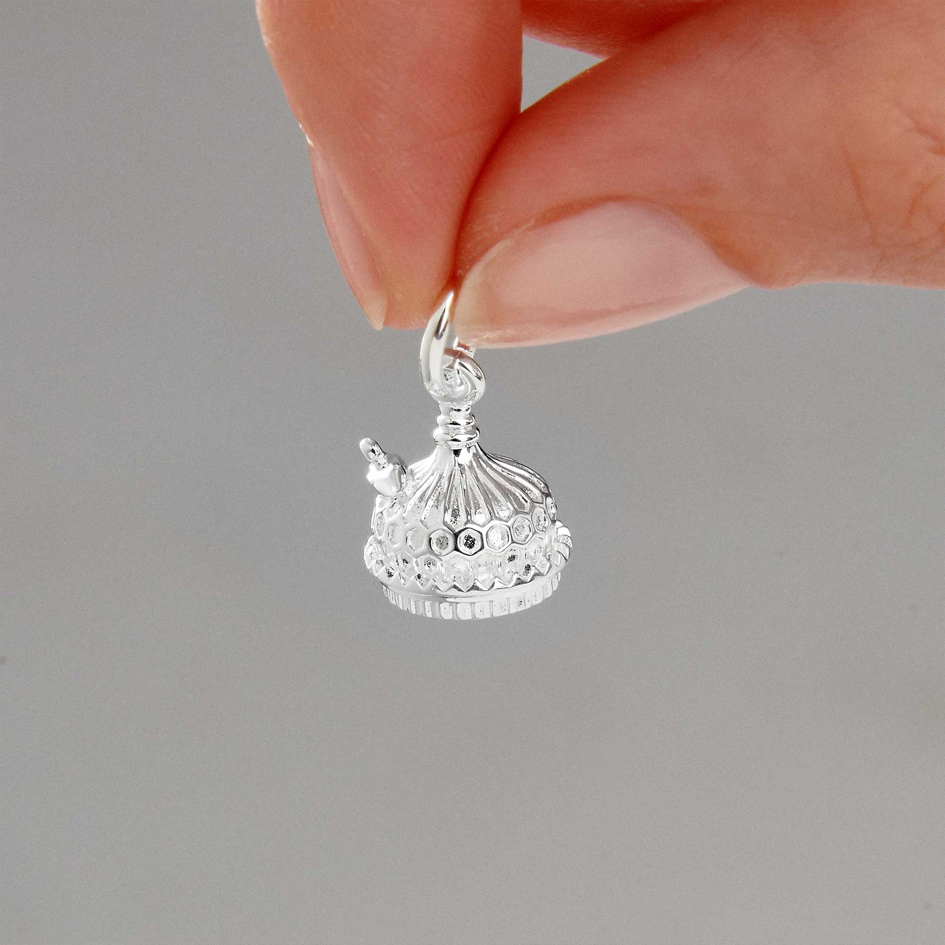 Silver charm shaped like the Brighton Pavilion, detailed and polished, by Scarlett Jewellery.