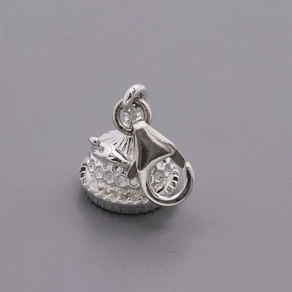 Silver charm shaped like the Brighton Pavilion, detailed and polished, displayed on a white background by Scarlett Jewellery.