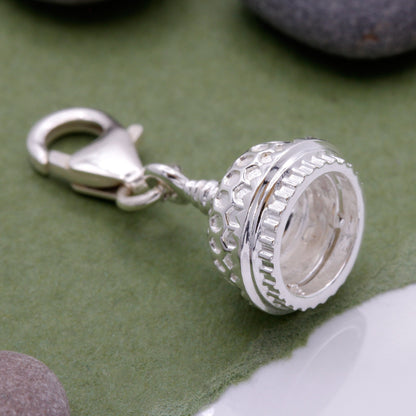 Silver charm shaped like the Brighton Pavilion, detailed and polished, by Scarlett Jewellery.