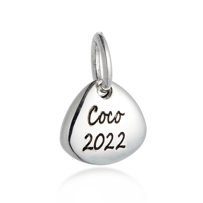 Silver paw print charm with personalized engraving, part of the Scarlett Jewellery charm collection.