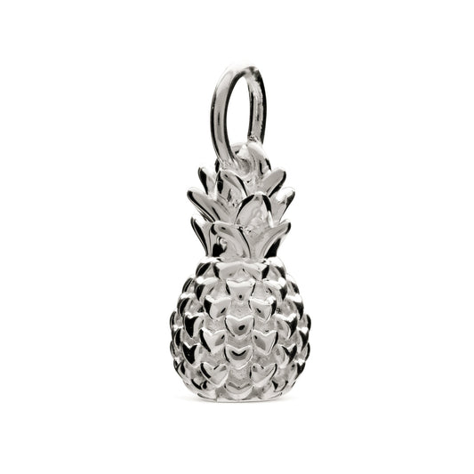 A silver pineapple charm shaped like a tropical fruit, detailed with texture and shine, by Scarlett Jewellery.
