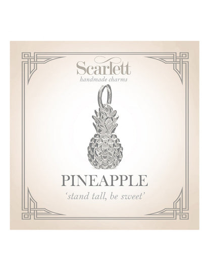 Silver pineapple charm with intricate detailing, displayed on a white background, by Scarlett Jewellery.
