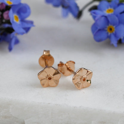 Tiny rose gold vermeil stud earrings with a delicate forget-me-not design by Scarlett Jewellery