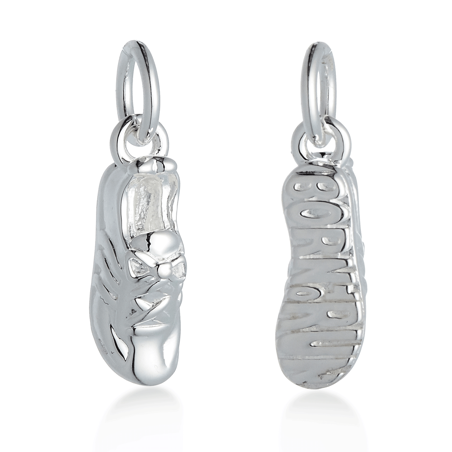 Silver charm with detailed etching on a running shoe by Scarlett Jewellery.