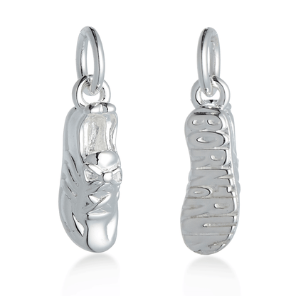 Silver charm with detailed etching on a running shoe by Scarlett Jewellery.