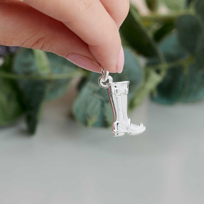 Silver charm with personalized engraving on a welly boot by Scarlett Jewellery.