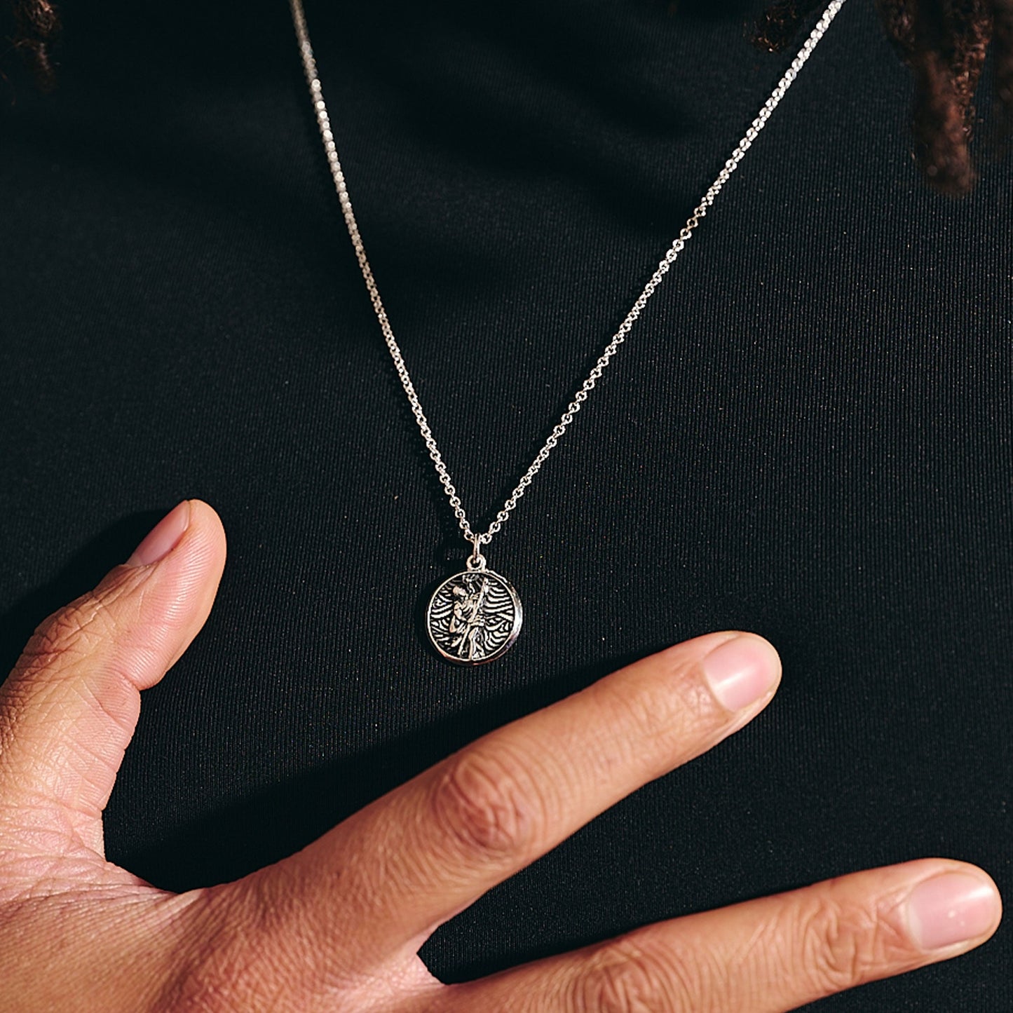 Silver St Christopher necklace with storm design, small size, by Scarlett Jewellery.