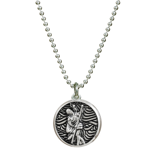 A small silver St Christopher necklace with a detailed cross design by Scarlett Jewellery