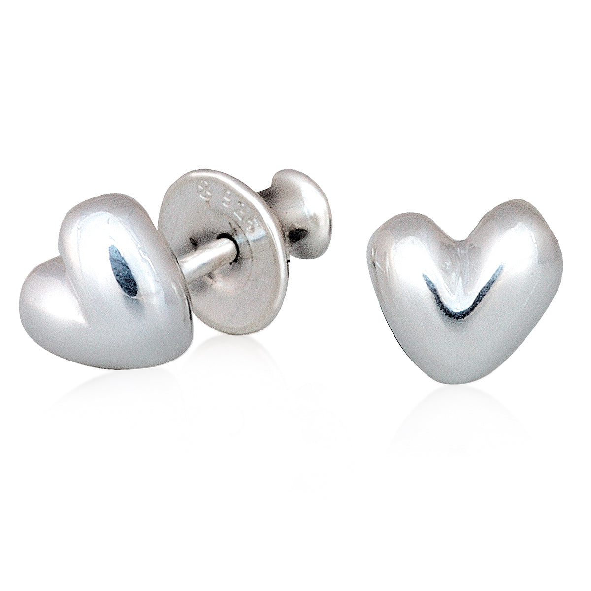Sweetheart silver stud earrings with delicate heart design, close-up shot by Scarlett Jewellery.