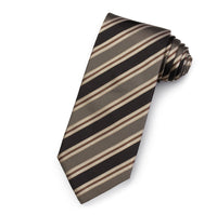 A navy blue silk stripe tie with a subtle pattern, worn around a collar, by Benson & Clegg.