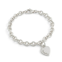 A silver heart tag charm bracelet with personalized engraving by Scarlett Jewellery