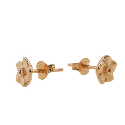 Tiny rose gold vermeil stud earrings with a forget-me-not design by Scarlett Jewellery