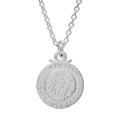 Silver St Christopher pendant on a chain with personalized engraving, styled on a wooden table.