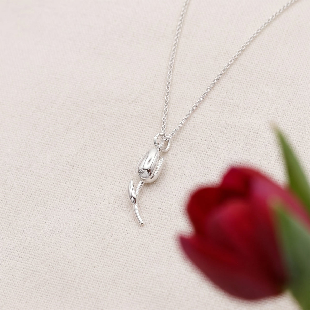 Silver tulip flower charm with detailed petal texture, part of the Charms collection by Scarlett Jewellery.