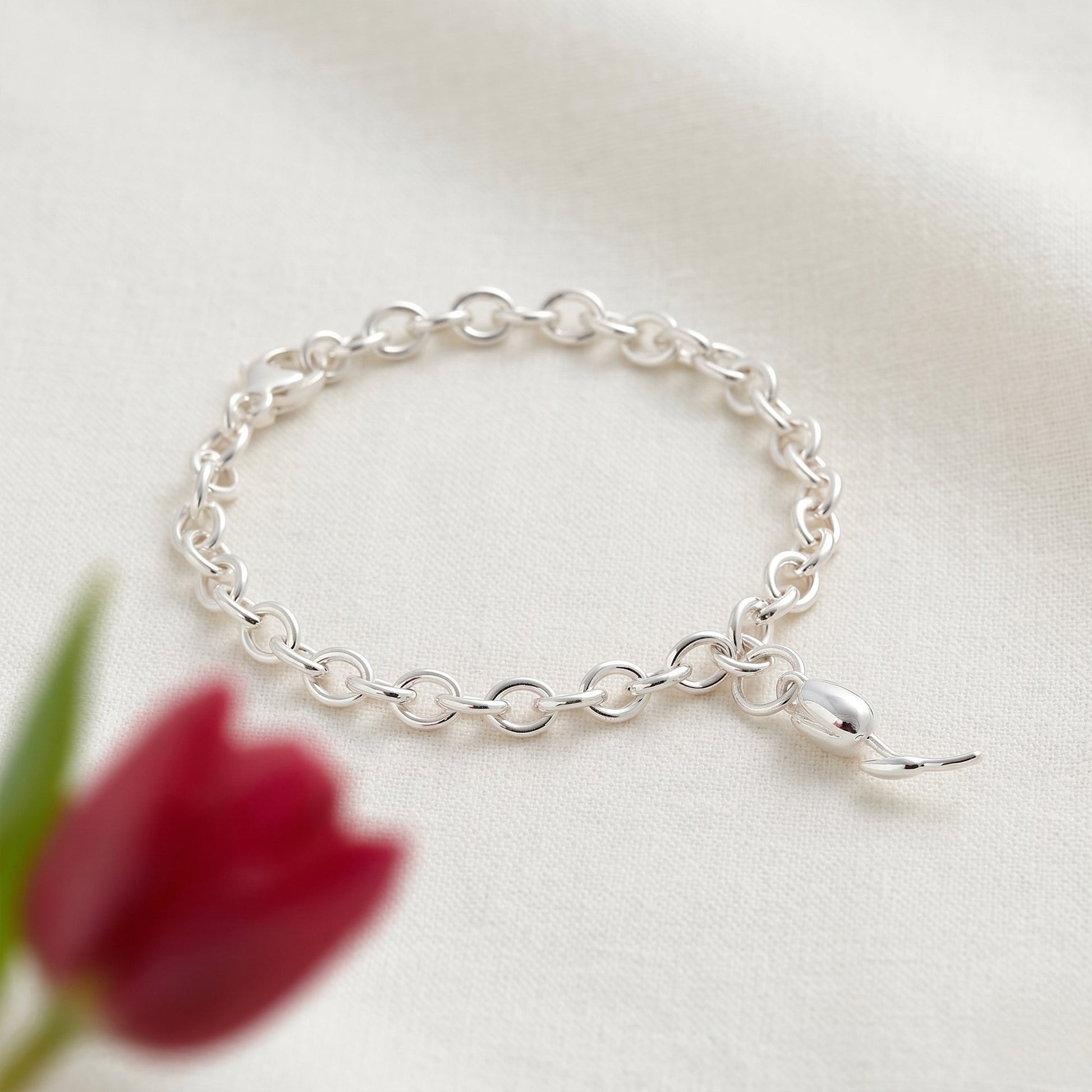 Silver tulip flower charm with detailed petal texture, part of the Charms collection by Scarlett Jewellery.