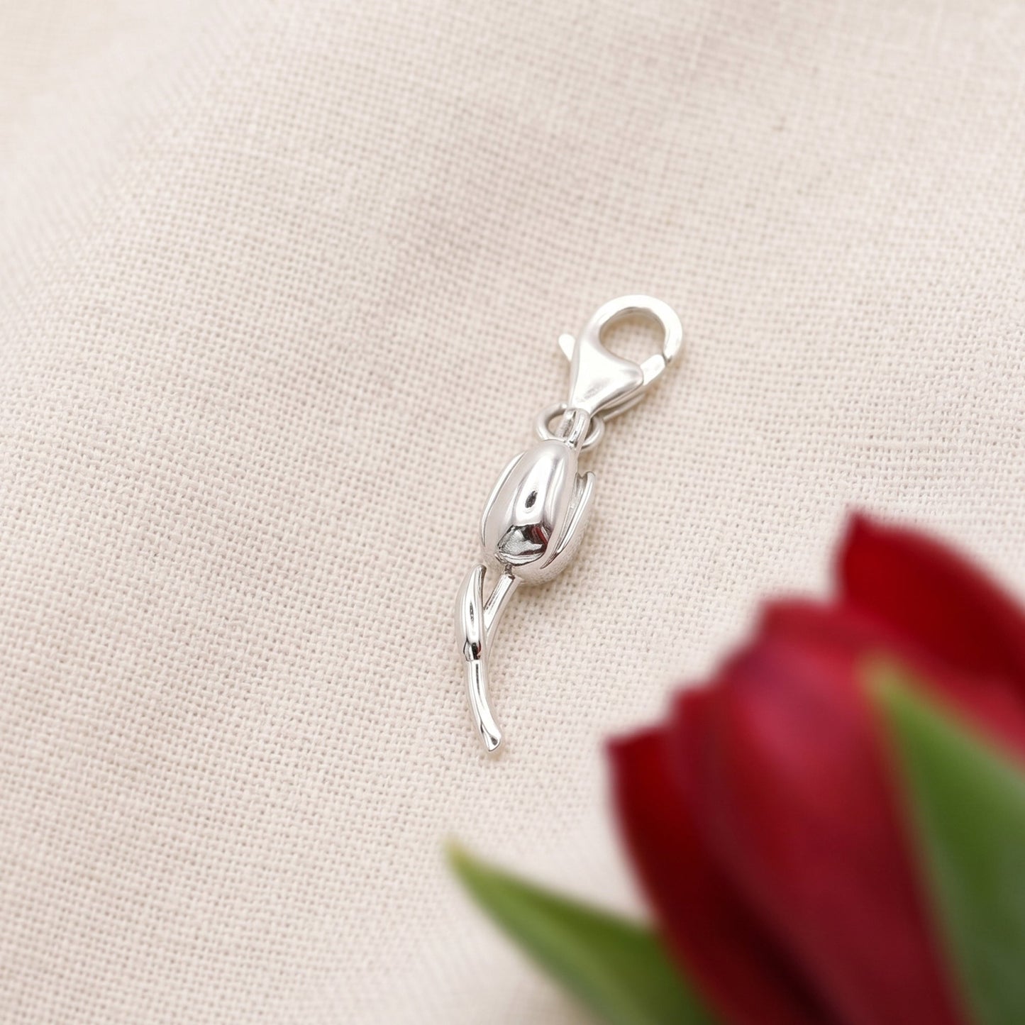Silver tulip flower charm with detailed petal texture, part of the Charms collection by Scarlett Jewellery.