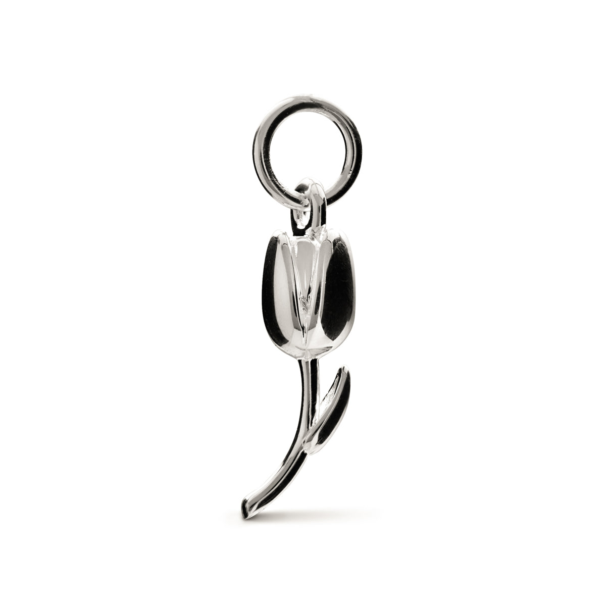 A silver tulip flower charm with intricate detailing, displayed on a soft background, by Scarlett Jewellery.