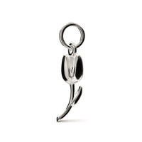 A silver tulip flower charm with intricate detailing, displayed on a soft background, by Scarlett Jewellery.