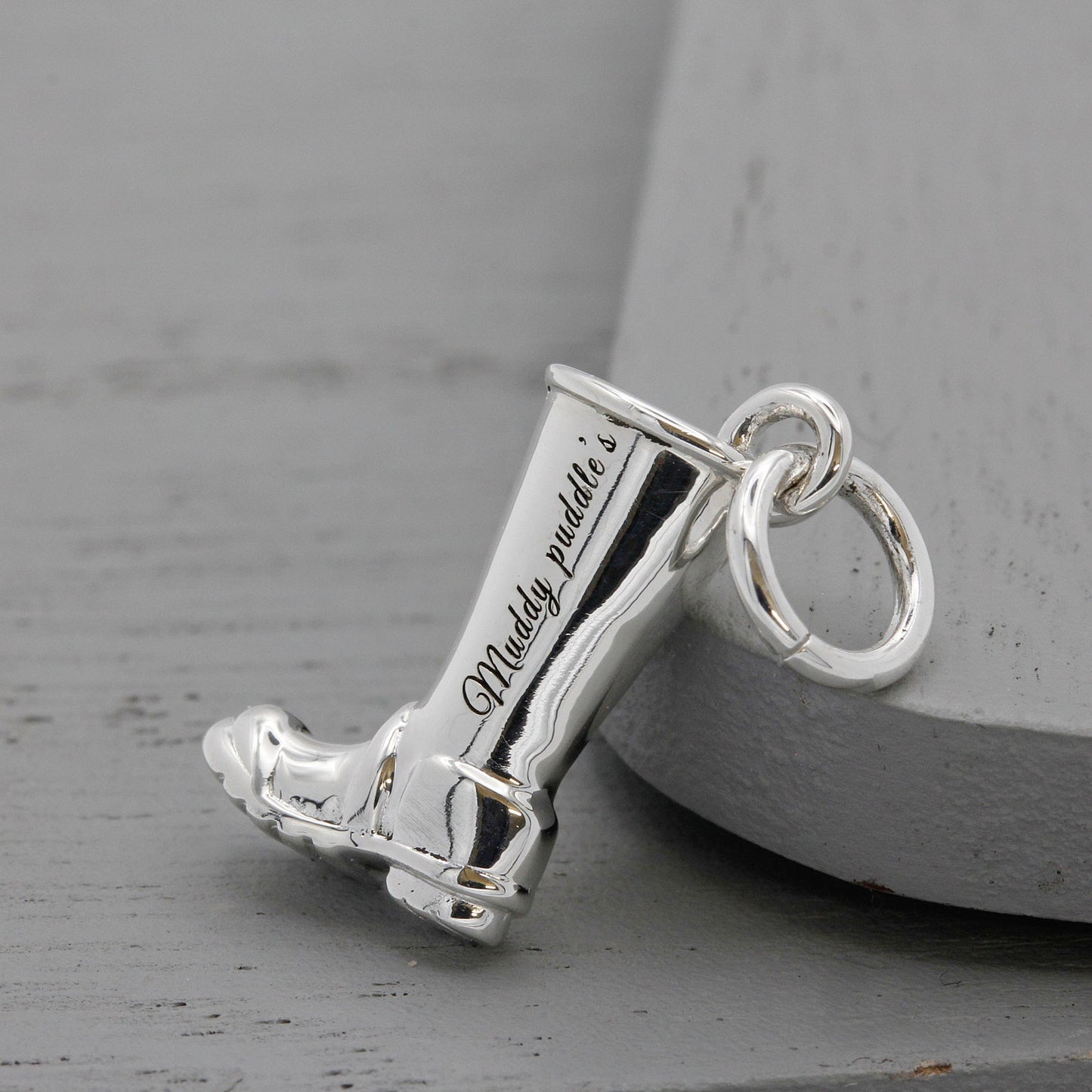 Silver charm with engraved heart and name on a welly boot by Scarlett Jewellery.