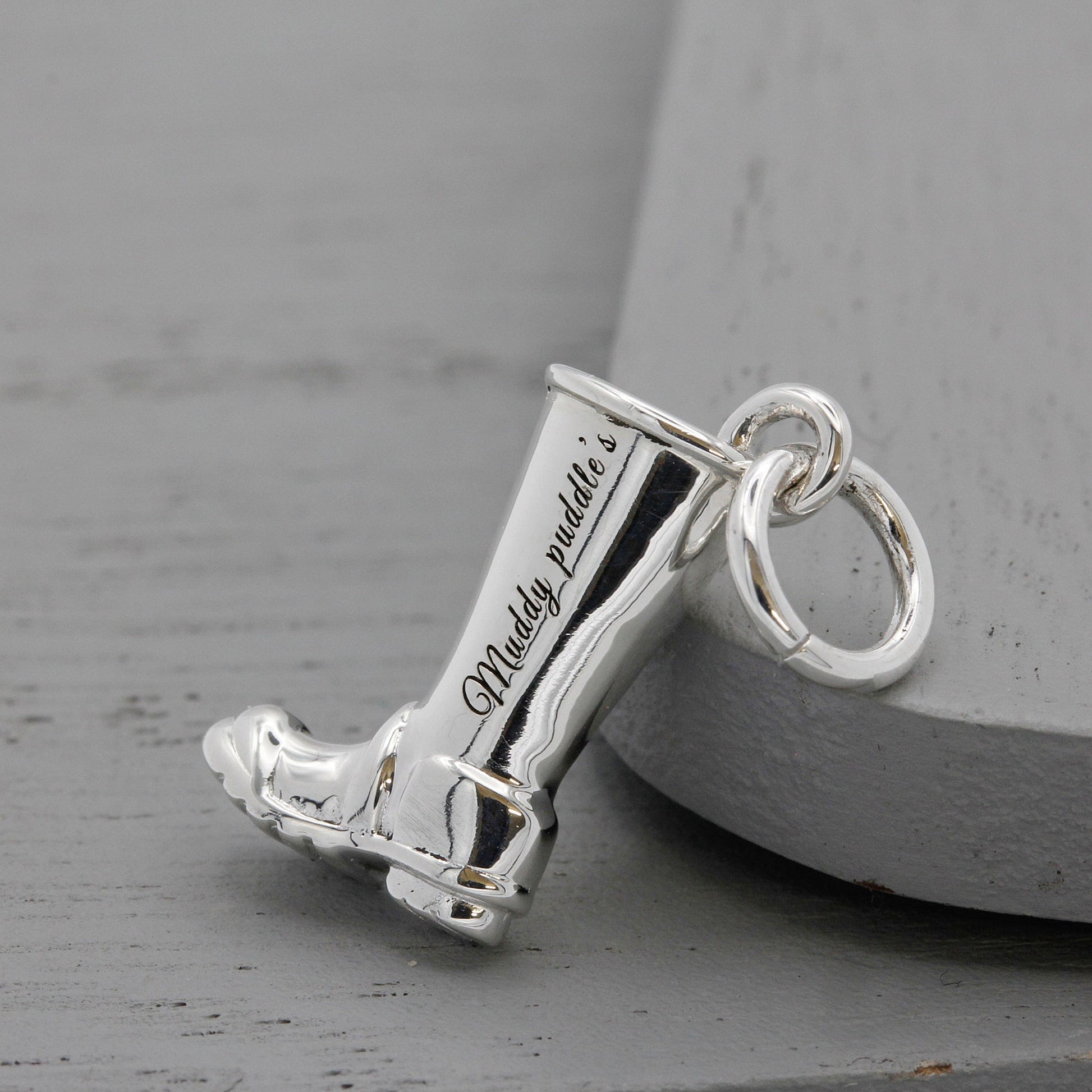 Silver charm with engraved heart and name on a welly boot by Scarlett Jewellery.