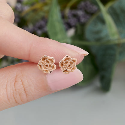 Wild rose gold vermeil silver stud earrings with a polished finish by Scarlett Jewellery