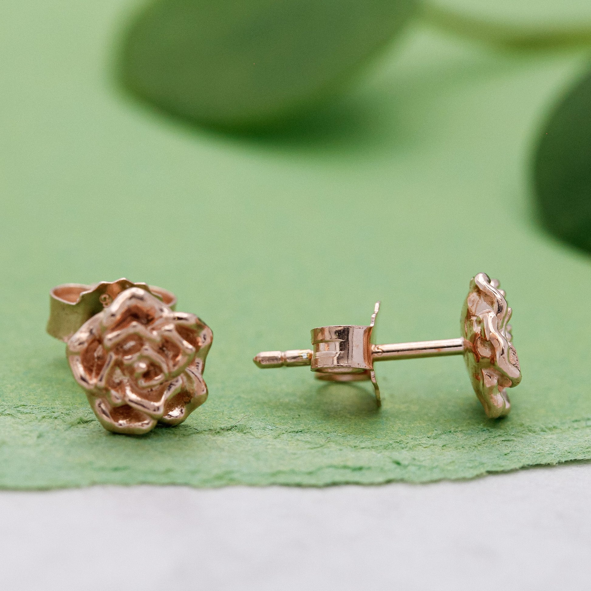 Wild rose gold vermeil silver stud earrings with delicate floral detailing by Scarlett Jewellery.