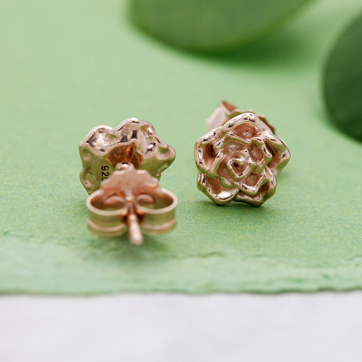 Wild rose gold vermeil silver stud earrings with delicate floral details by Scarlett Jewellery.